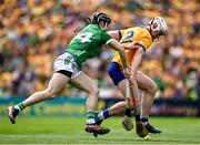 11 June 2023; Adam Hogan of Clare in action against Graeme Mulcahy of Limerick during the Munster GAA Hurling Championship Final match between Clare and Limerick at TUS Gaelic Grounds in Limerick. Photo by Eóin Noonan/Sportsfile