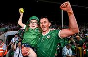 11 June 2023; Gearoid Hegarty of Limerick celebrates with a supporter after the Munster GAA Hurling Championship Final match between Clare and Limerick at TUS Gaelic Grounds in Limerick. Photo by Eóin Noonan/Sportsfile