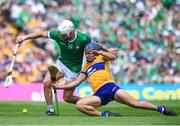 11 June 2023; Aaron Gillane of Limerick in action against Cian Nolan of Clare during the Munster GAA Hurling Championship Final match between Clare and Limerick at TUS Gaelic Grounds in Limerick. Photo by John Sheridan/Sportsfile