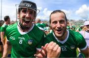 11 June 2023; Limerick players, from left, Darragh O'Donovan and Tom Morrissey celebrate after the Munster GAA Hurling Championship Final match between Clare and Limerick at TUS Gaelic Grounds in Limerick. Photo by John Sheridan/Sportsfile