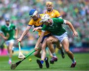 11 June 2023; Kyle Hayes of Limerick in action against Diarmuid Ryan of Clare during the Munster GAA Hurling Championship Final match between Clare and Limerick at TUS Gaelic Grounds in Limerick. Photo by John Sheridan/Sportsfile
