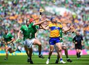 11 June 2023; Shane O'Donnell of Clare in action against Barry Nash of Limerick during the Munster GAA Hurling Championship Final match between Clare and Limerick at TUS Gaelic Grounds in Limerick. Photo by John Sheridan/Sportsfile