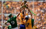 11 June 2023; Cathal Malone of Clare gets to the ball ahead of William O'Donoghue of Limerick during the Munster GAA Hurling Championship Final match between Clare and Limerick at TUS Gaelic Grounds in Limerick. Photo by Daire Brennan/Sportsfile