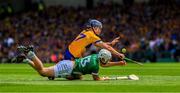 11 June 2023; Aaron Gillane of Limerick is tackled by Cian Nolan of Clare during the Munster GAA Hurling Championship Final match between Clare and Limerick at TUS Gaelic Grounds in Limerick. Photo by Ray McManus/Sportsfile