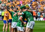 11 June 2023; Limerick players, from left, Peter Casey, William O'Donoghue and Dan Morrissey celebrate after the Munster GAA Hurling Championship Final match between Clare and Limerick at TUS Gaelic Grounds in Limerick. Photo by Ray McManus/Sportsfile