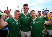 11 June 2023; Limerick players, from left, Peter Casey, Gearoid Hegarty and Graeme Mulcahy celebrate after the Munster GAA Hurling Championship Final match between Clare and Limerick at TUS Gaelic Grounds in Limerick. Photo by Ray McManus/Sportsfile