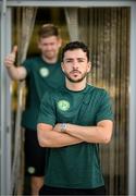 12 June 2023; Mikey Johnston poses for a portrait, as team-mate Nathan Collins walks by, during a Republic of Ireland media conference at Calista Luxury Resort in Antalya, Turkey. Photo by Stephen McCarthy/Sportsfile