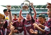 12 June 2023; Adam Brannigan from Holy Family SNS, Swords, centre, celebrates with the trophy and teammates after they won the Corn Sean O Rinn cup match against Scoil Thomas, Laurel Lodge at the Allianz Cumann na mBunscol Finals at Croke Park. Photo by David Fitzgerald/Sportsfile