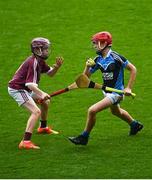 12 June 2023; Lachlan Finlay from Scoil Thomáis, Laurel Lodge in action against Ben Cunningham from Holy Family SNS, Swords during the Corn Sean O Rinn Final at the Allianz Cumann na mBunscol Finals at Croke Park. Photo by David Fitzgerald/Sportsfile