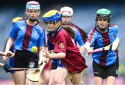 12 June 2023; Alanna McArdle of St Columbas NS, Glasnevin in action against Róisín Murphy of Scoil Mhuire NS, Woodview, during the Corn INTO Final match at the Allianz Cumann na mBunscol Finals at Croke Park. Photo by David Fitzgerald/Sportsfile