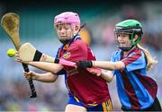 12 June 2023; Ella McMunn of St Columbas NS, Glasnevin in action against Róisín Murphy of Scoil Mhuire NS, Woodview, during the Corn INTO Final match at the Allianz Cumann na mBunscol Finals at Croke Park. Photo by David Fitzgerald/Sportsfile