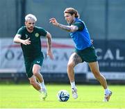 13 June 2023; Jeff Hendrick and Troy Parrott, left, during a Republic of Ireland training session at Calista Sports Centre in Antalya, Turkey. Photo by Stephen McCarthy/Sportsfile
