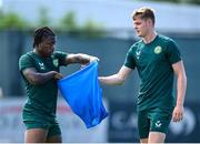 13 June 2023; Michael Obafemi, left, and Evan Ferguson swap bibs during a Republic of Ireland training session at Calista Sports Centre in Antalya, Turkey. Photo by Stephen McCarthy/Sportsfile