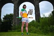 13 June 2023; Ben Conneely of Offaly poses for a portrait with the Liam MacCarthy cup at the 2023 GAA Hurling All-Ireland Series national launch at Kilmacthomas Viaduct in Waterford. Photo by Brendan Moran/Sportsfile
