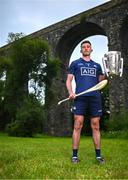 13 June 2023; Seán Brennan of Dublin poses for a portrait with the Liam MacCarthy cup at the 2023 GAA Hurling All-Ireland Series national launch at Kilmacthomas Viaduct in Waterford. Photo by Brendan Moran/Sportsfile
