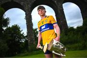 13 June 2023; Adam Hogan of Clare poses for a portrait with the Liam MacCarthy cup at the 2023 GAA Hurling All-Ireland Series national launch at Kilmacthomas Viaduct in Waterford. Photo by Brendan Moran/Sportsfile