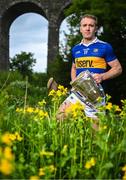 13 June 2023; Noel McGrath of Tipperary poses for a portrait with the Liam MacCarthy cup at the 2023 GAA Hurling All-Ireland Series national launch at Kilmacthomas Viaduct in Waterford. Photo by Brendan Moran/Sportsfile