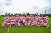 13 June 2023; At the 2023 GAA Hurling All-Ireland Series national launch at De La Salle GAA Club in Waterford are  Cathal O’Neill of Limerick, Noel McGrath of Tipperary, Brian Tracey of Carlow, Richie Reid of Kilkenny, Uachtarán Chumann Lúthchleas Gael Larry McCarthy, hidden, De La Salle club chairman Don Lalor, Ben Connelly of Offaly, Adam Hogan of Clare, Seán Brennan of Dublin, Padraic Mannion of Galway and members of the De La Salle GAA Club 9 to 10 year old players including Millie Furlong holding the Liam MacCarthy Cup aloft. Photo by Ray McManus/Sportsfile