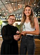 13 June 2023; Antrim’s Orlaith Prenter, right, is presented with The Croke Park/LGFA Player of the Month award for May 2023 by Edele O’Reilly, Director of Sales and Marketing, The Croke Park, at the Croke Park on Jones Road in Dublin. Orlaith was in brilliant form for Antrim during the month of May, as the Saffrons captured a very first TG4 Ulster Intermediate title. Six points against Monaghan in the round-robin phase booked a place in the Final for Antrim, as Orlaith scored 1-8 against Tyrone to help secure the provincial silverware. Photo by Sam Barnes/Sportsfile