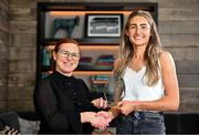 13 June 2023; Antrim’s Orlaith Prenter, right, is presented with The Croke Park/LGFA Player of the Month award for May 2023 by Edele O’Reilly, Director of Sales and Marketing, The Croke Park, at the Croke Park on Jones Road in Dublin. Orlaith was in brilliant form for Antrim during the month of May, as the Saffrons captured a very first TG4 Ulster Intermediate title. Six points against Monaghan in the round-robin phase booked a place in the Final for Antrim, as Orlaith scored 1-8 against Tyrone to help secure the provincial silverware. Photo by Sam Barnes/Sportsfile