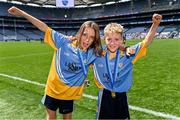 13 June 2023; Brothers and teammates Tom O'Brien, left, and Fionn O'Brien of St Mary's BNS Rathfarnham celebrate after beating St Laurence's BNS Kilmacud in the Corn Herald Final at the Allianz Cumann na mBunscol Finals at Croke Park. Photo by Piaras Ó Mídheach/Sportsfile