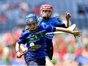 13 June 2023; Rachel Costello of Pope John Paul II NS Malahide in action against Muireann Nolan of St Attracta's SNS Dundrum, behind, during the Corn Olly Quinlan Final at the Allianz Cumann na mBunscol Finals at Croke Park. Photo by Piaras Ó Mídheach/Sportsfile
