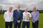13 June 2023; At the 2023 GAA Hurling All-Ireland Series national launch at De La Salle GAA Club in Waterford are left to right, eir operations manager Trevor Prendergast, Uachtarán Chumann Lúthchleas Gael Larry McCarthy, Centra retailer in Kilmacthomas, Waterford, Pat Phelan, with the Liam MacCarthy Cup, and John Phelan, eir operations manager Trevor Prendergast Photo by Ray McManus/Sportsfile