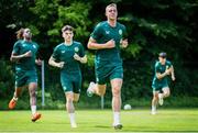 14 June 2023; Republic of Ireland players, from right, Killian Phillips, Andrew Moran and Bosun Lawal during a Republic of Ireland training session at Parktherme-Arena Bad Radkersburg in Austria. Photo by Blaz Weindorfer/Sportsfile