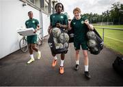 14 June 2023; Republic of Ireland players, from left, Aidomo Emakhu, Bosun Lawal, Jack Henry-Francis arrive to a Republic of Ireland training session at Parktherme-Arena Bad Radkersburg in Austria. Photo by Blaz Weindorfer/Sportsfile
