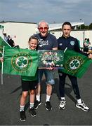 16 June 2023; Mulhern family, from left, Molly, age 9, James, and Jack, age 12, from Swords, Dublin, before a Republic of Ireland women open training session at UCD Bowl in Dublin. Photo by Ramsey Cardy/Sportsfile