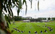 16 June 2023; Players stretch during a Republic of Ireland women open training session at UCD Bowl in Dublin. Photo by Ramsey Cardy/Sportsfile