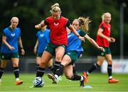 16 June 2023; Saoirse Noonan and Chloe Mustaki, right, during a Republic of Ireland women open training session at UCD Bowl in Dublin. Photo by Ramsey Cardy/Sportsfile