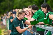 16 June 2023; Saoirse Noonan with supporters during a Republic of Ireland women open training session at UCD Bowl in Dublin. Photo by Ramsey Cardy/Sportsfile