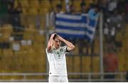 16 June 2023; John Egan of Republic of Ireland reacts after the second goal for Greece, scored by Giorgos Masouras, not pictured, during the UEFA EURO 2024 Championship qualifying group B match between Greece and Republic of Ireland at the OPAP Arena in Athens, Greece. Photo by Stephen McCarthy/Sportsfile