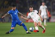 16 June 2023; Jayson Molumby of Republic of Ireland in action against Taxiarchis Fountas of Greece during the UEFA EURO 2024 Championship qualifying group B match between Greece and Republic of Ireland at the OPAP Arena in Athens, Greece. Photo by Stephen McCarthy/Sportsfile
