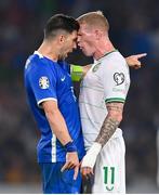 16 June 2023; Tasos Bakasetas of Greece and James McClean of Republic of Ireland during the UEFA EURO 2024 Championship qualifying group B match between Greece and Republic of Ireland at the OPAP Arena in Athens, Greece. Photo by Seb Daly/Sportsfile