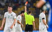 16 June 2023; Matt Doherty of Republic of Ireland is shown a red card by referee Harald Lechner during the UEFA EURO 2024 Championship qualifying group B match between Greece and Republic of Ireland at the OPAP Arena in Athens, Greece. Photo by Seb Daly/Sportsfile