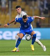 16 June 2023; Giorgos Giakoumakis of Greece in action against John Egan of Republic of Ireland during the UEFA EURO 2024 Championship qualifying group B match between Greece and Republic of Ireland at the OPAP Arena in Athens, Greece. Photo by Seb Daly/Sportsfile