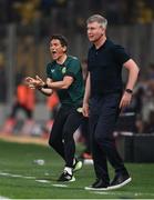 16 June 2023; Republic of Ireland coach Keith Andrews, left, and manager Stephen Kenny during the UEFA EURO 2024 Championship qualifying group B match between Greece and Republic of Ireland at the OPAP Arena in Athens, Greece. Photo by Seb Daly/Sportsfile