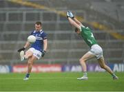 17 June 2023; Colm Murphy of Laois in action against Mike Donovan of Limerick during the Tailteann Cup Quarter Final match between Limerick and Laois at TUS Gaelic Grounds in Limerick. Photo by Tom Beary/Sportsfile
