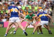 17 June 2023; Paddy Clancy of Offaly in action against Tipperary players Craig Morgan, Michael Breen, and Ronan Maher during the GAA Hurling All-Ireland Senior Championship Preliminary Quarter Final match between Offaly and Tipperary at Glenisk O'Connor Park in Tullamore, Offaly. Photo by Michael P Ryan/Sportsfile