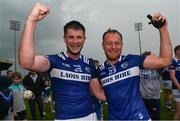 17 June 2023; Brian Daly, left, and Damien O Connor of Laois celebrate after the Tailteann Cup Quarter Final match between Limerick and Laois at TUS Gaelic Grounds in Limerick. Photo by Tom Beary/Sportsfile