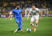 16 June 2023; Pantelis Hatzidiakos of Greece in action against Evan Ferguson of Republic of Ireland during the UEFA EURO 2024 Championship qualifying group B match between Greece and Republic of Ireland at the OPAP Arena in Athens, Greece. Photo by Stephen McCarthy/Sportsfile