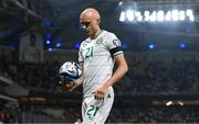 16 June 2023; A laser is shone at Will Smallbone of Republic of Ireland as he prepares to take a corner kick during the UEFA EURO 2024 Championship qualifying group B match between Greece and Republic of Ireland at the OPAP Arena in Athens, Greece. Photo by Stephen McCarthy/Sportsfile