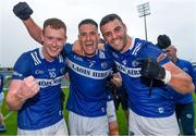 17 June 2023; Laois players, from left, Colm Murphy, Patrick O Sullivan and Robert Pigott of Laois celebrate after the Tailteann Cup Quarter Final match between Limerick and Laois at TUS Gaelic Grounds in Limerick. Photo by Tom Beary/Sportsfile