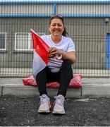 17 June 2023; Majella Cassidy, mother of Derry Player Paul Cassidy, takes a break before the GAA Football All-Ireland Senior Championship Round 3 match between Derry and Clare at Glennon Brothers Pearse Park in Longford. Photo by Stephen Marken/Sportsfile