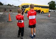 17 June 2023; Lucas Bonham, age 9, and Ollie McCann, age 11, from Limavaddy, video the arrival of the Derry team before the GAA Football All-Ireland Senior Championship Round 3 match between Derry and Clare at Glennon Brothers Pearse Park in Longford. Photo by Stephen Marken/Sportsfile