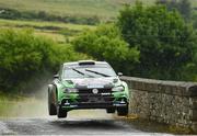 17 June 2023; Jason Mitchell and Paddy McCrudden in their VW Polo GTI R5 during day two of the Wilton Recycling Donegal International Rally round 5 of the Irish Tarmac Championship at Portsalon in Donegal. Photo by Philip Fitzpatrick/Sportsfile