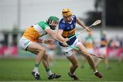 17 June 2023; Mark Kehoe of Tipperary in action against Ben Conneely of Offaly during the GAA Hurling All-Ireland Senior Championship Preliminary Quarter Final match between Offaly and Tipperary at Glenisk O'Connor Park in Tullamore, Offaly. Photo by Michael P Ryan/Sportsfile