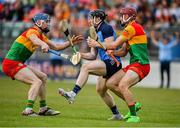 17 June 2023; Cian O'Sullivan of Dublin in action against  Jack McCullagh, right, and Diarmuid Byrne of Carlow during the GAA Hurling All-Ireland Senior Championship Preliminary Quarter Final match between Carlow and Dublin at Netwatch Cullen Park in Carlow. Photo by Sam Barnes/Sportsfile